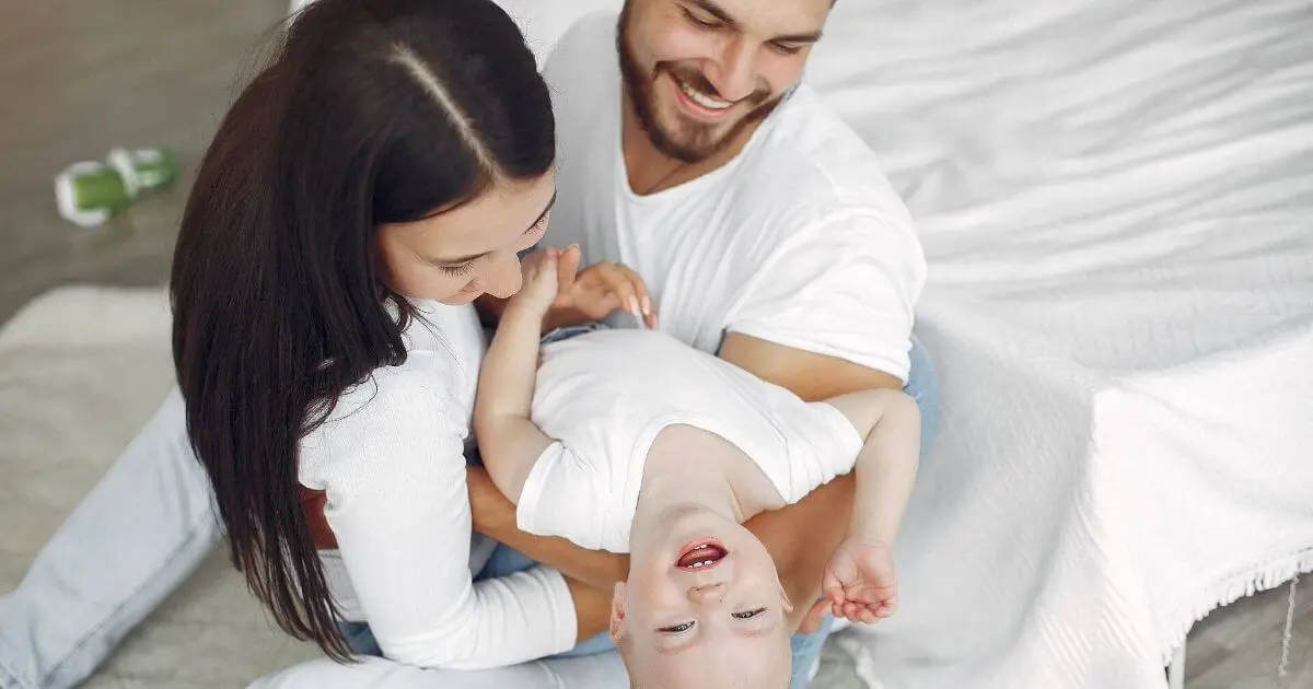 Gentle Parenting in Real Life – a beautiful family spending quality time together in the bathroom, sharing calm routines, connection, and everyday caregiving moments.