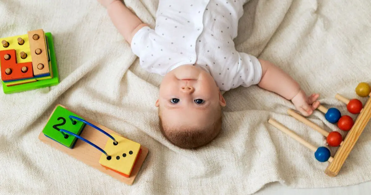 What to Watch for During Summer? Sensory Activities Toddlers and Babies Love (0–12 Months) Mom and baby enjoying Sensory Activities Toddlers love, exploring colorful toys, blocks, textures, and interactive play together on the living room floor.