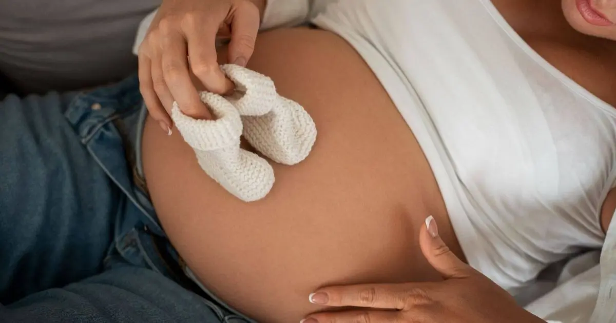 Preparing for Labor: What Happens to Your Body, Your Baby, and Your Mind High-angle view of a pregnant woman spending quiet time indoors, capturing calmness, reflection, and the gentle anticipation of motherhood.