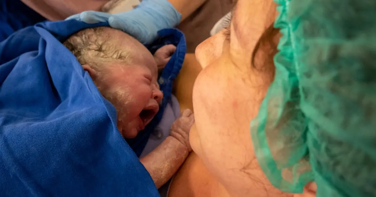 The Real Birth Story: From Fear to Strength mother meeting her newborn baby right after childbirth, emotional first moment