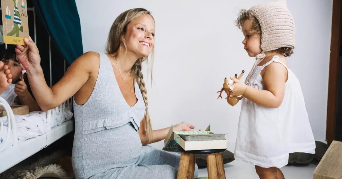 Healthy Mom Lifestyle: Finding Balance, Energy, and Joy in Motherhood Mom Guilt: young-yogi-mother-boat-pose-with-her-little-daughte