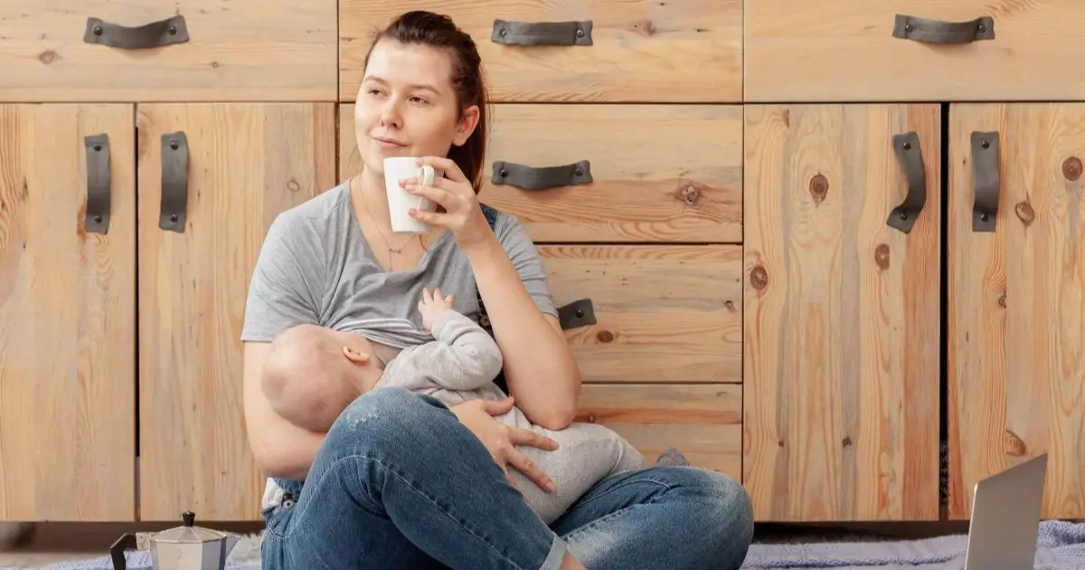 Sleep Deprivation Deluxe: When Coffee Becomes a Lifestyle and Makeup Is Just a Myth sleep deprivation mother at home holding baby during a quiet moment
