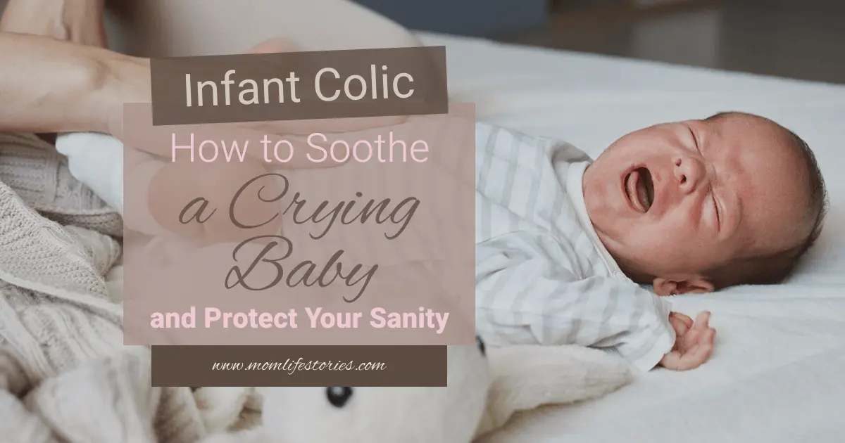 Infant Colic – How to Soothe a Crying Baby and Protect Your Sanity: mother gently massaging crying baby’s tummy to relieve colic discomfort