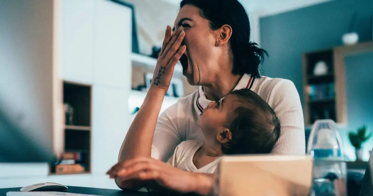 Sleep Deprivation Deluxe: When Coffee Becomes a Lifestyle and Makeup Is Just a Myth Mom burnout support and recovery — diverse group of people working together around a meeting table, representing connection, teamwork, and shared strength.