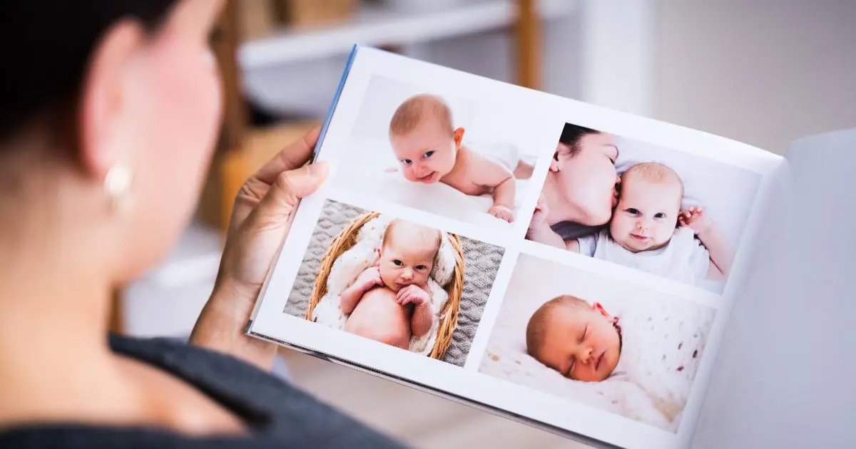 Mother’s Day memory photo album with baby pictures, capturing special first moments of motherhood