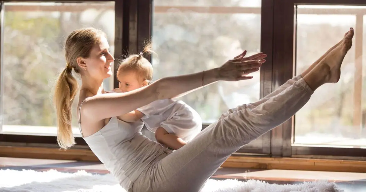 Healthy Mom Lifestyle: Finding Balance, Energy, and Joy in Motherhood Mom Guilt: young-yogi-mother-boat-pose-with-her-little-daughte